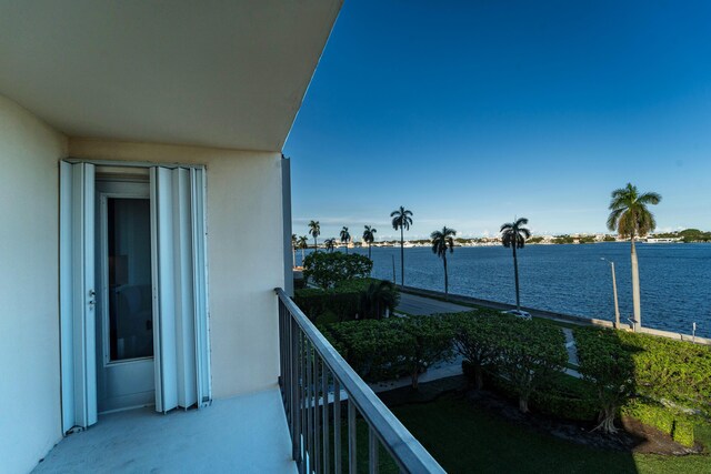 balcony featuring a water view