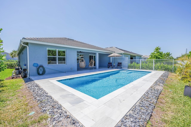 view of pool with a fenced backyard, a fenced in pool, and a patio