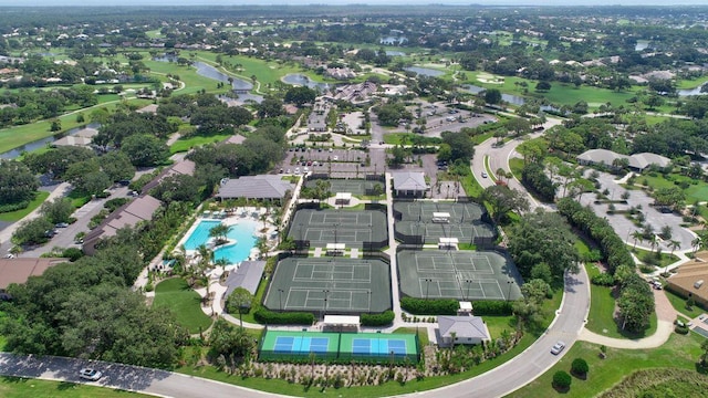 bird's eye view with a residential view, a water view, and view of golf course