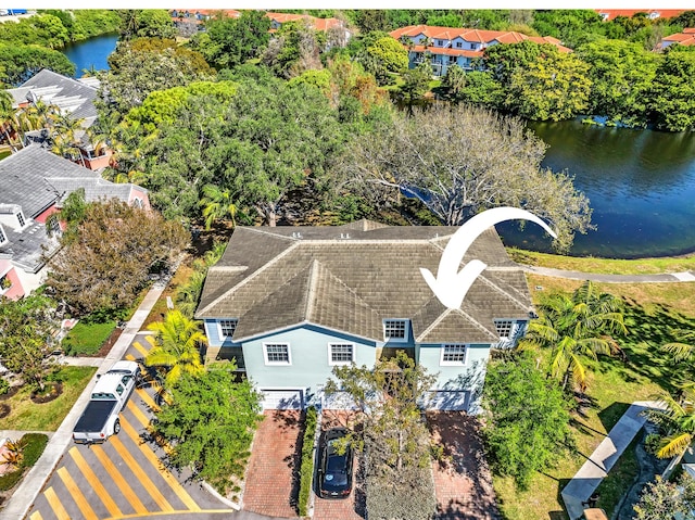 bird's eye view with a water view