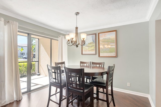5801 Camino Del Sol Unit 102, Boca Raton, FL 33433 - dining space featuring an inviting chandelier, wood finished floors, baseboards, and ornamental molding