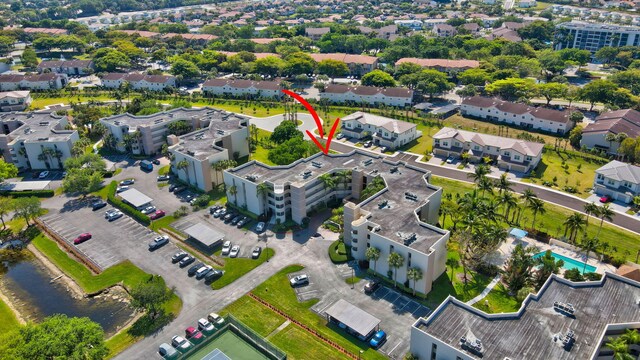 5801 Camino Del Sol Unit 102, Boca Raton, FL 33433 - birds eye view of property with a residential view and a water view