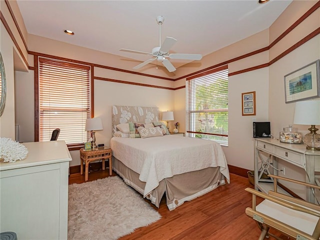 bedroom featuring light wood-style flooring, recessed lighting, baseboards, and ceiling fan