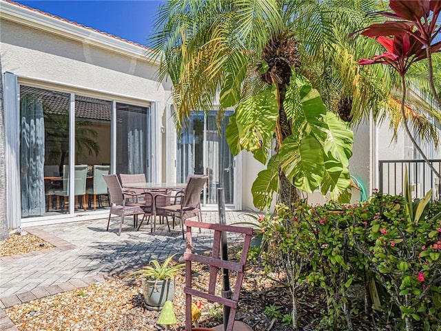 view of patio featuring outdoor dining area