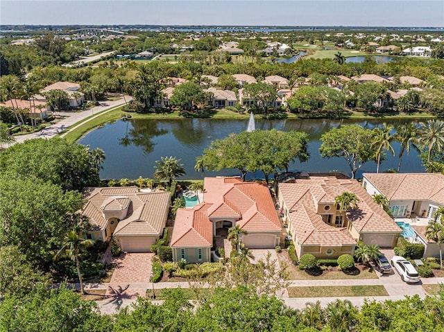 aerial view featuring a residential view and a water view