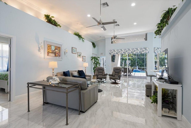 living room with visible vents, baseboards, marble finish floor, and crown molding