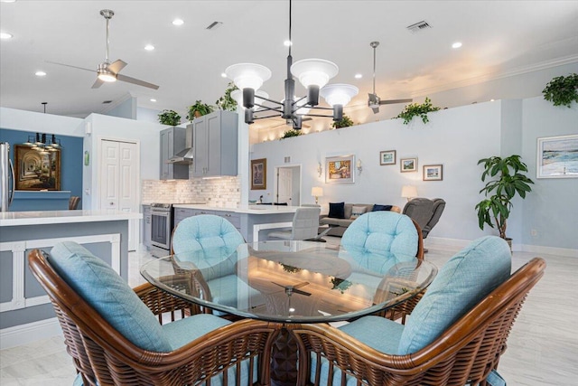 dining area featuring visible vents, recessed lighting, ceiling fan with notable chandelier, and baseboards