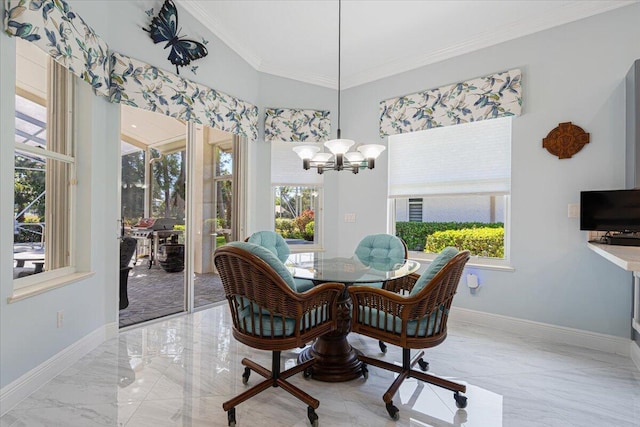 dining room with crown molding, a notable chandelier, baseboards, and marble finish floor