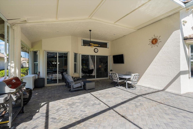 view of patio / terrace featuring area for grilling and ceiling fan