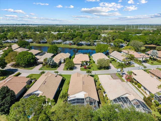 bird's eye view with a water view and a residential view