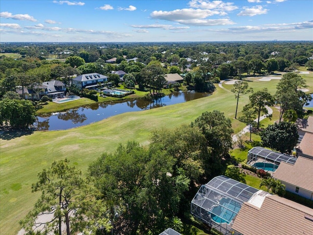 bird's eye view featuring golf course view and a water view