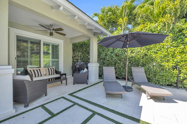 view of patio / terrace with area for grilling, an outdoor hangout area, and a ceiling fan