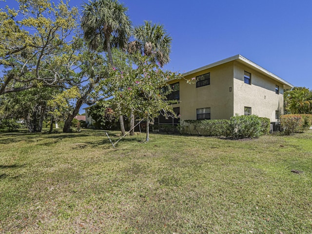 400 18th St Unit D3, Vero Beach, FL 32960 - view of yard with central AC