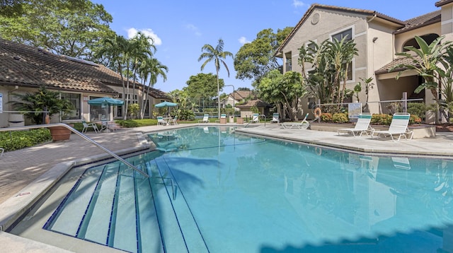 pool featuring a patio