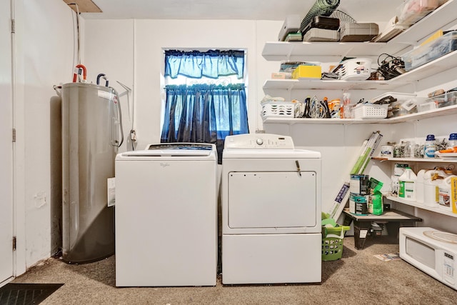 laundry room with independent washer and dryer, laundry area, and water heater