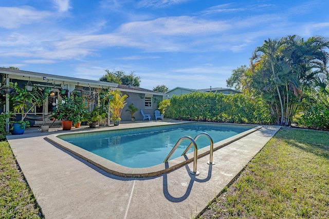 pool featuring a patio area