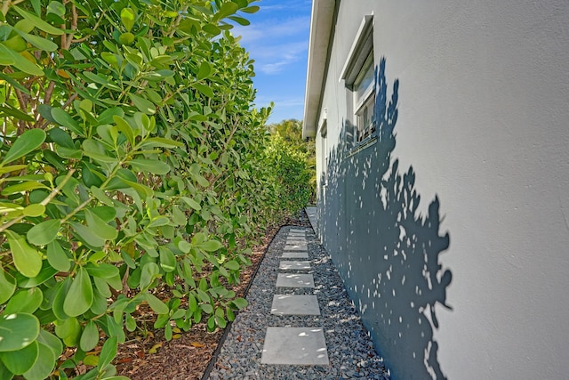 view of home's exterior with stucco siding