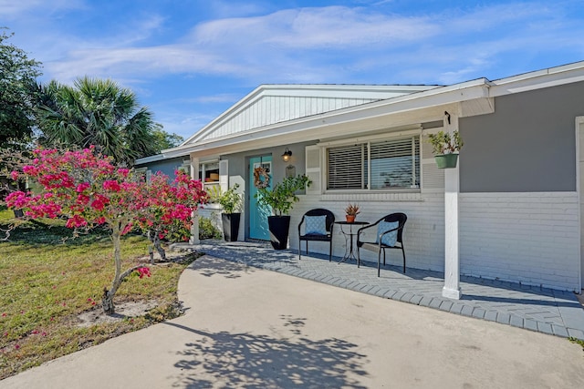 view of front of home with brick siding