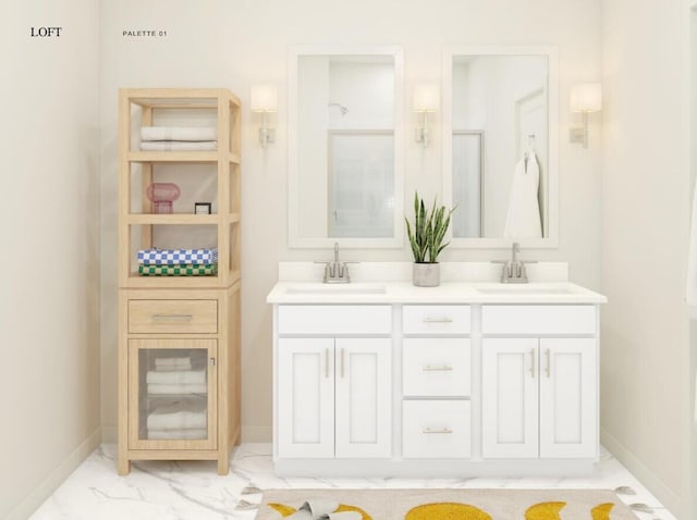 bathroom with a sink, baseboards, marble finish floor, and double vanity