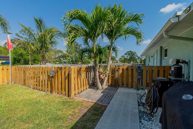 view of yard with a fenced backyard