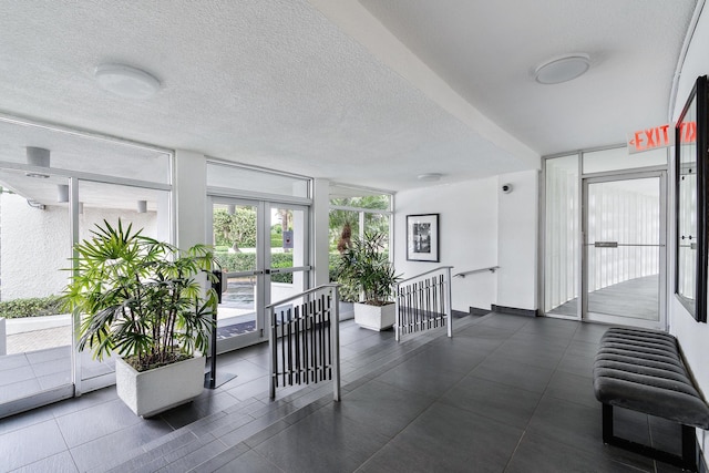 2760 S Ocean Blvd Unit 416, Palm Beach, FL 33480 - common area with a textured ceiling