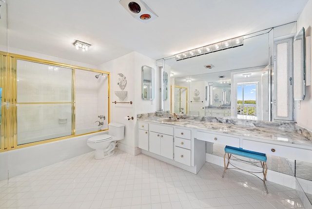 2760 S Ocean Blvd Unit 416, Palm Beach, FL 33480 - bathroom featuring toilet, bath / shower combo with glass door, vanity, and tile patterned floors