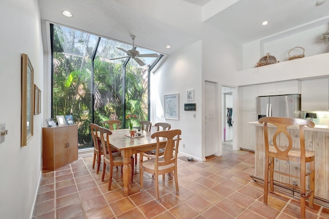 dining space with light tile patterned floors, ceiling fan, and recessed lighting