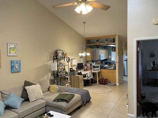 living room with light tile patterned flooring, ceiling fan with notable chandelier, and high vaulted ceiling