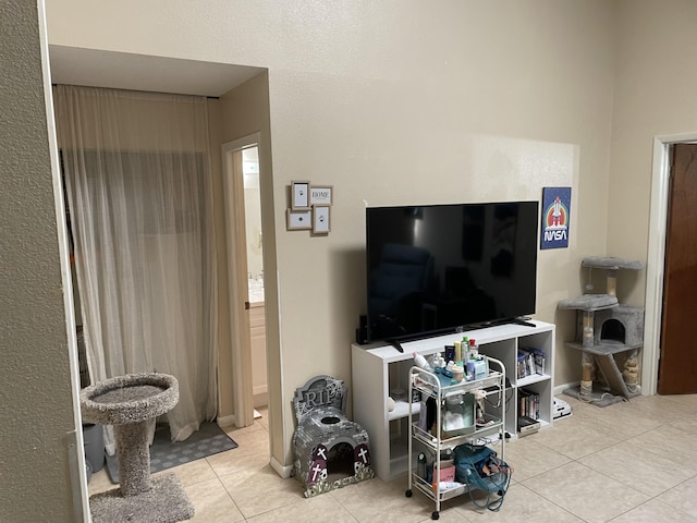 living area with tile patterned flooring