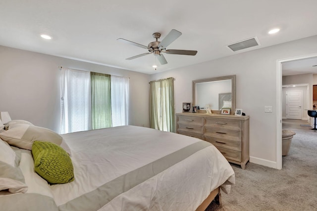 bedroom with recessed lighting, visible vents, baseboards, and light colored carpet