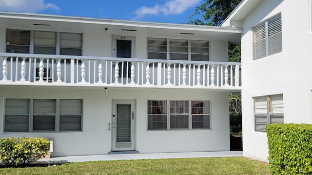 exterior space featuring stucco siding