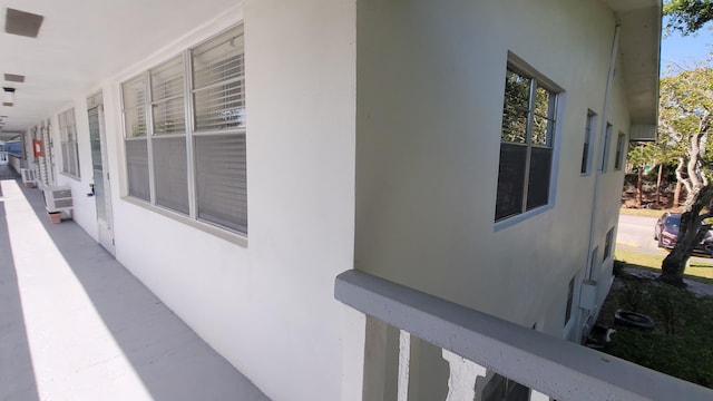 view of side of property with stucco siding