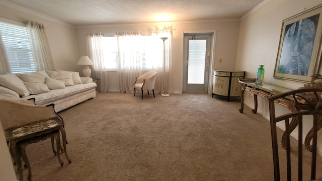 living room featuring light colored carpet, ornamental molding, and a textured ceiling