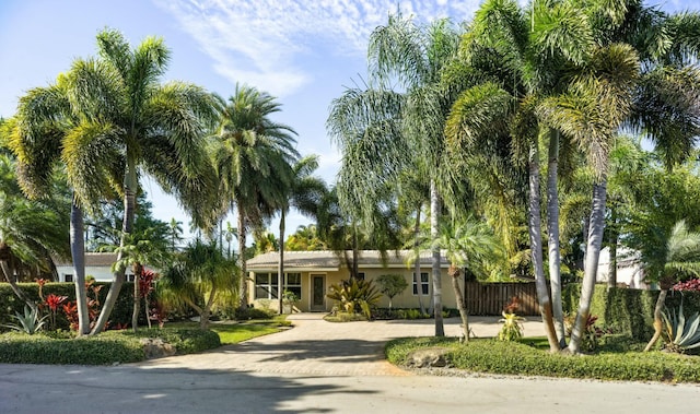 13 NE 26th Ct, Wilton Manors, FL 33334 - view of front of property featuring decorative driveway and stucco siding