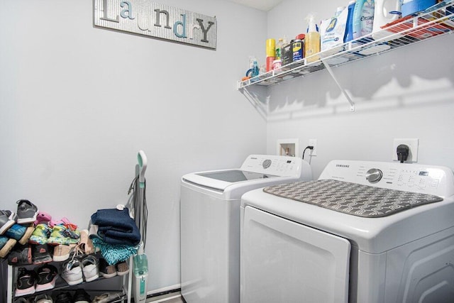 laundry area with washer and dryer and laundry area