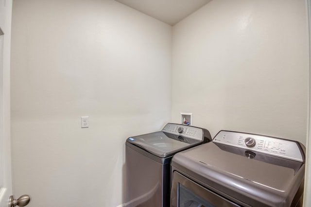 laundry area featuring laundry area and washer and dryer