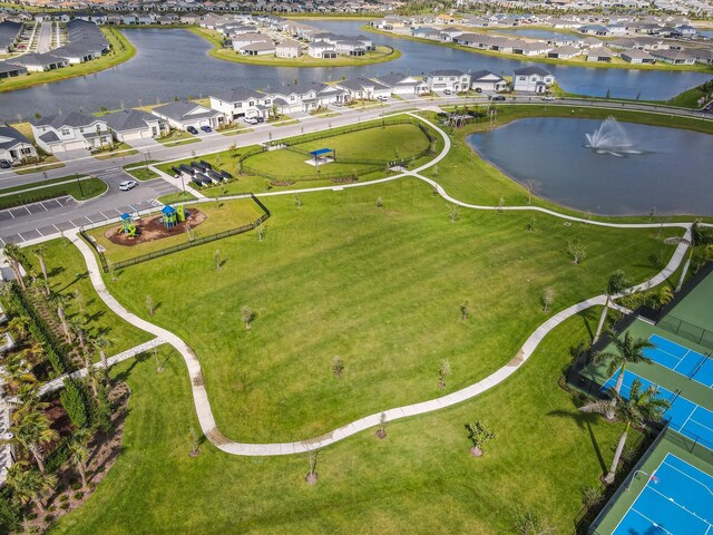 aerial view with a water view and a residential view