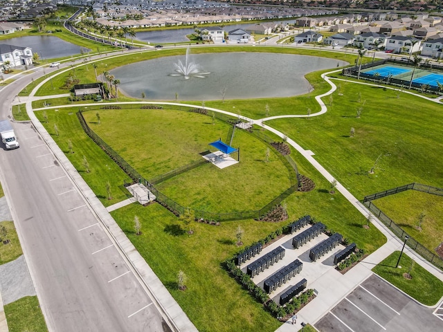 aerial view featuring a water view and a residential view