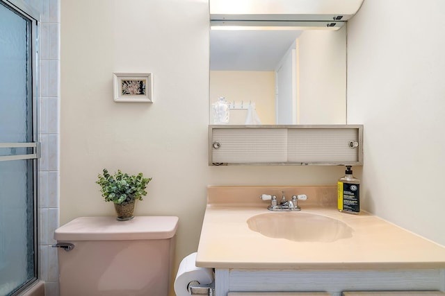 full bathroom featuring toilet and vanity