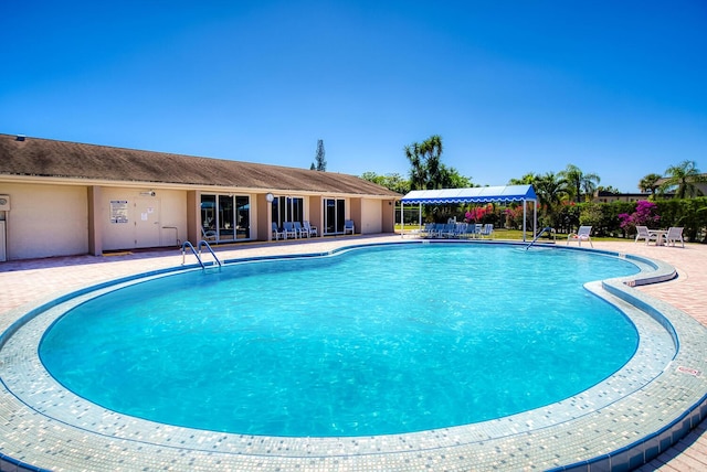 pool featuring a patio