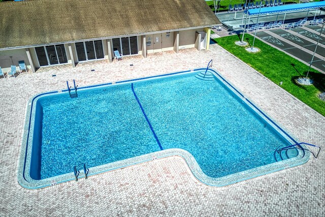 pool featuring a patio area