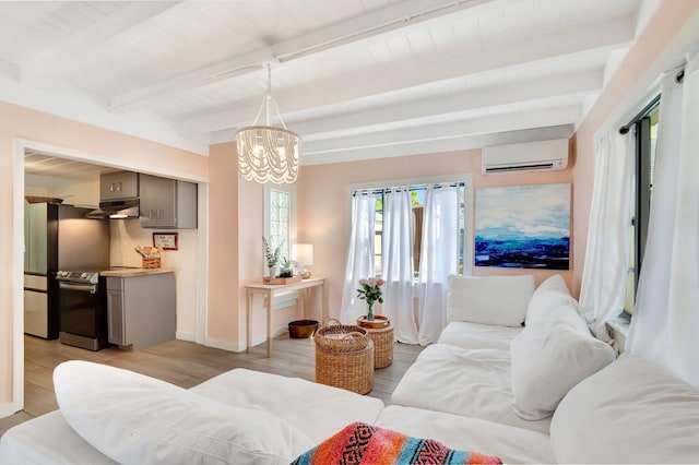 living room with beam ceiling, an inviting chandelier, light wood-style floors, and a wall mounted AC