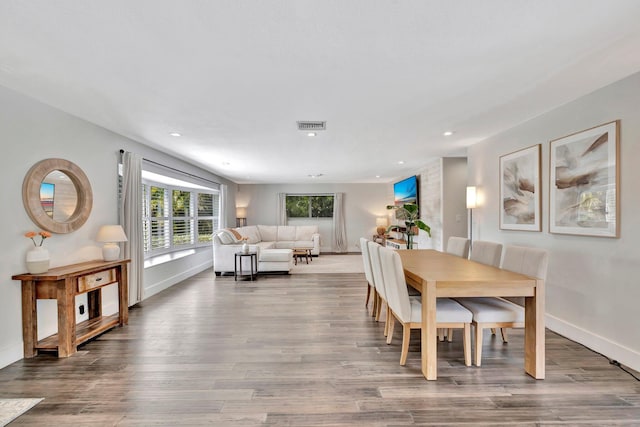 dining area featuring recessed lighting, wood finished floors, visible vents, and baseboards