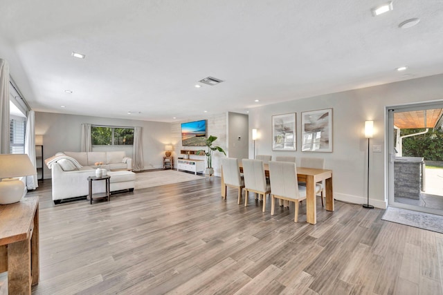 dining area with recessed lighting, visible vents, baseboards, and light wood-style flooring