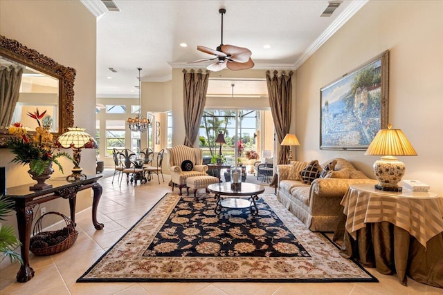 living room with visible vents, ornamental molding, tile patterned flooring, and ceiling fan with notable chandelier