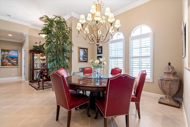 dining area with crown molding, a healthy amount of sunlight, and baseboards