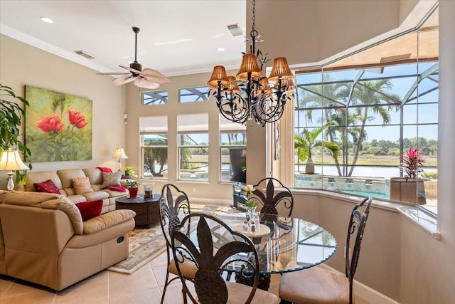 dining area featuring light tile patterned flooring, visible vents, and crown molding