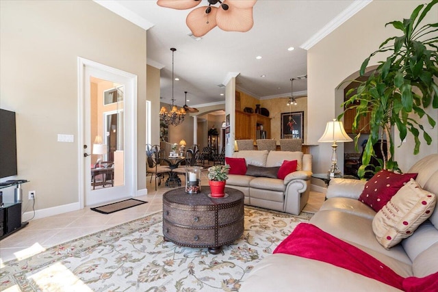 living room with baseboards, recessed lighting, ornamental molding, tile patterned flooring, and ceiling fan with notable chandelier