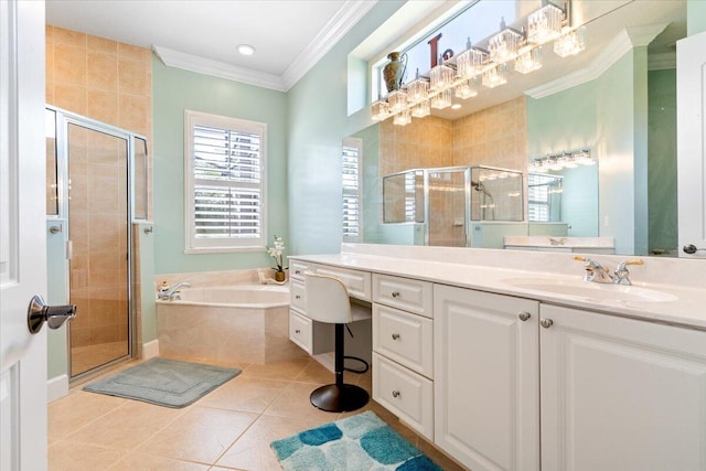 bathroom featuring a garden tub, a stall shower, crown molding, tile patterned flooring, and vanity