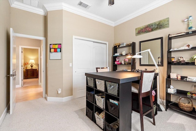 office area featuring visible vents, light carpet, baseboards, and ornamental molding